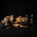 Close-up of Rook Perfumes Suede Eau de Parfum bottle featuring notes of bold leather and rich cognac on a neutral background.