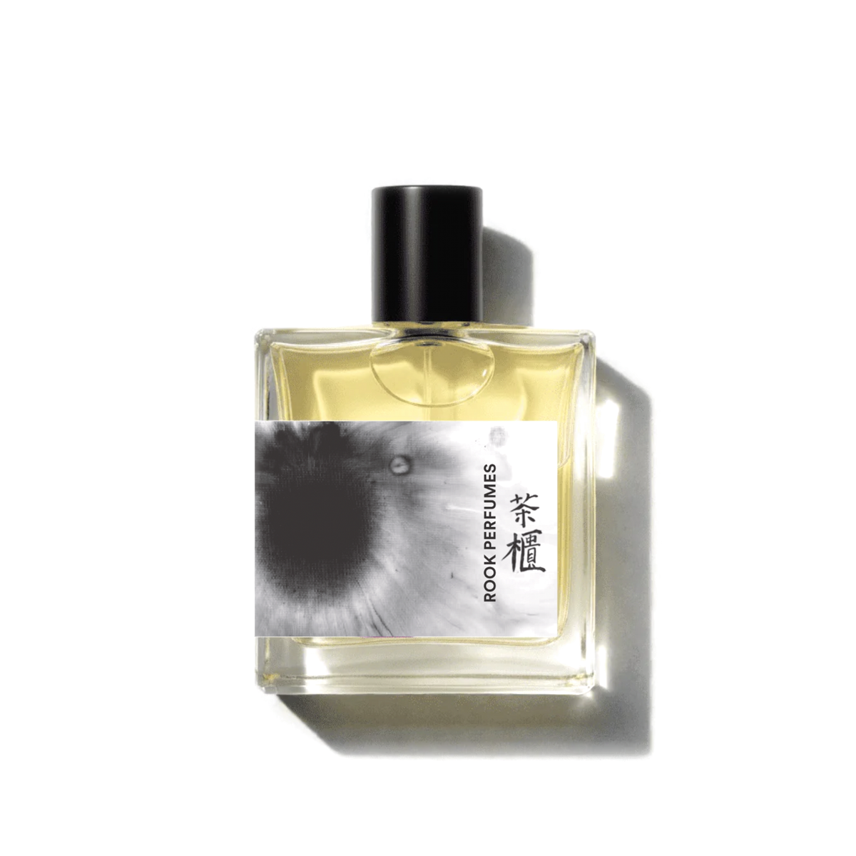 Lapsang Rosewood Woods Tea Chest Parfum by Rook Perfumes, showcasing an elegant wooden box with the fragrance bottle inside.